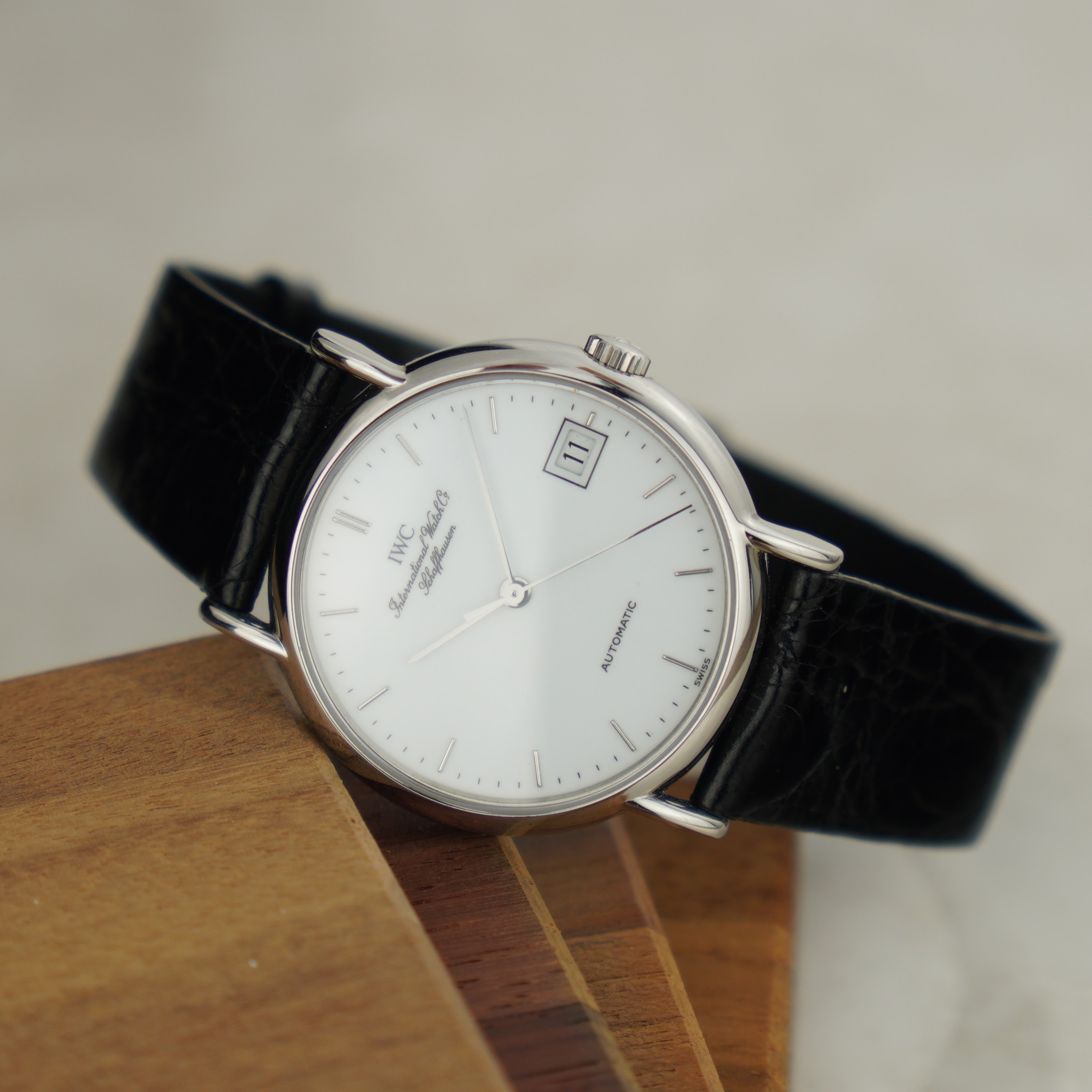 IWC Portofino 3513 from the 1990s. 34mm case, white dial and automatic movement N.O.S.