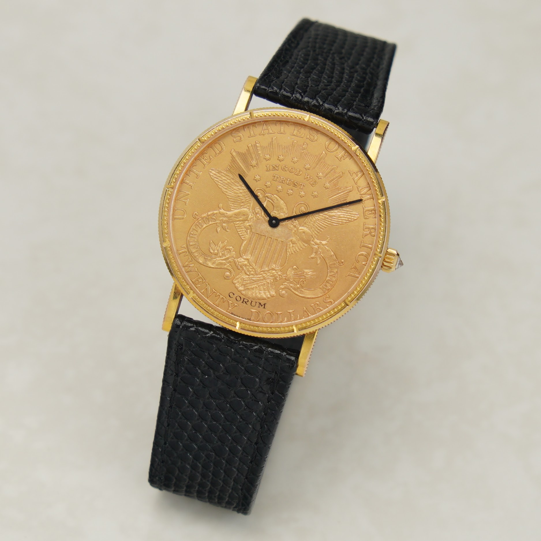 Corum 20 Dollar double eagle coin watch with 35mm case and manual-wind movement.